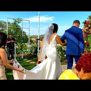 David’s Bridal Wedding dress worn once.Original price was 600 + bustle 200